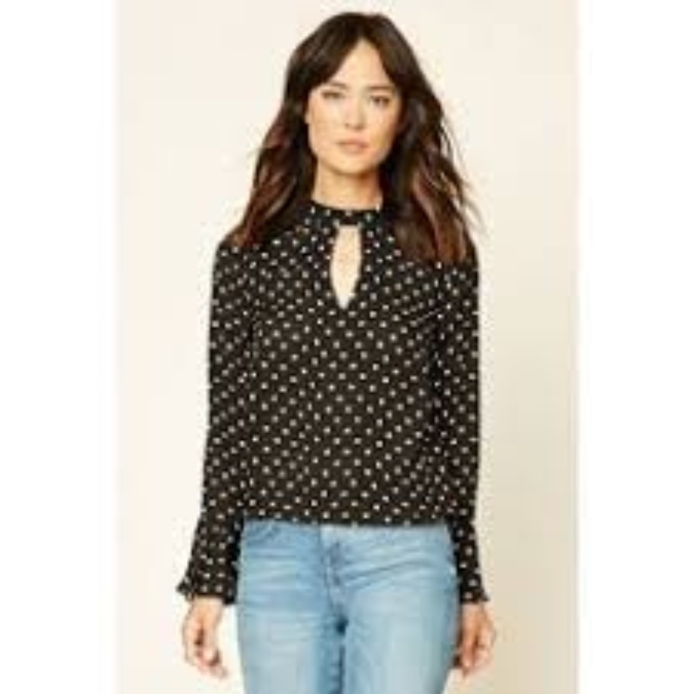 Black polka dot bell sleeved top